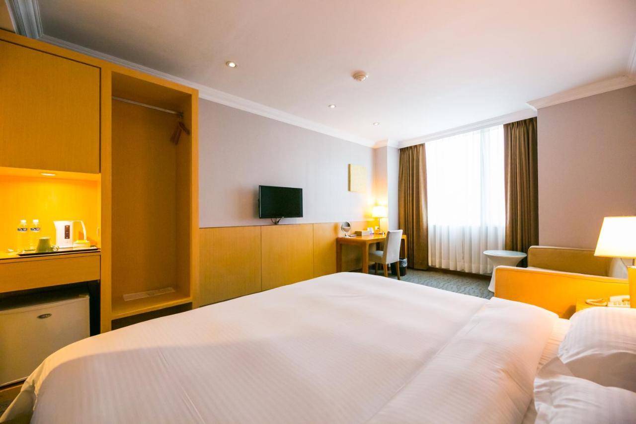 เจียวสี - เดอะ ริเวอร์ไซด์ Hotel เจียวซี ภายนอก รูปภาพ