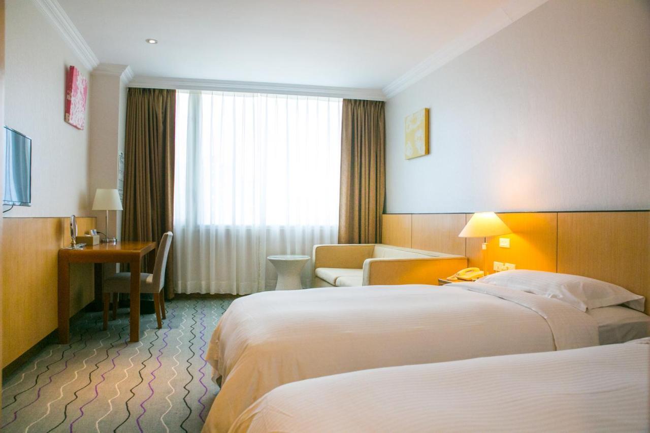 เจียวสี - เดอะ ริเวอร์ไซด์ Hotel เจียวซี ภายนอก รูปภาพ