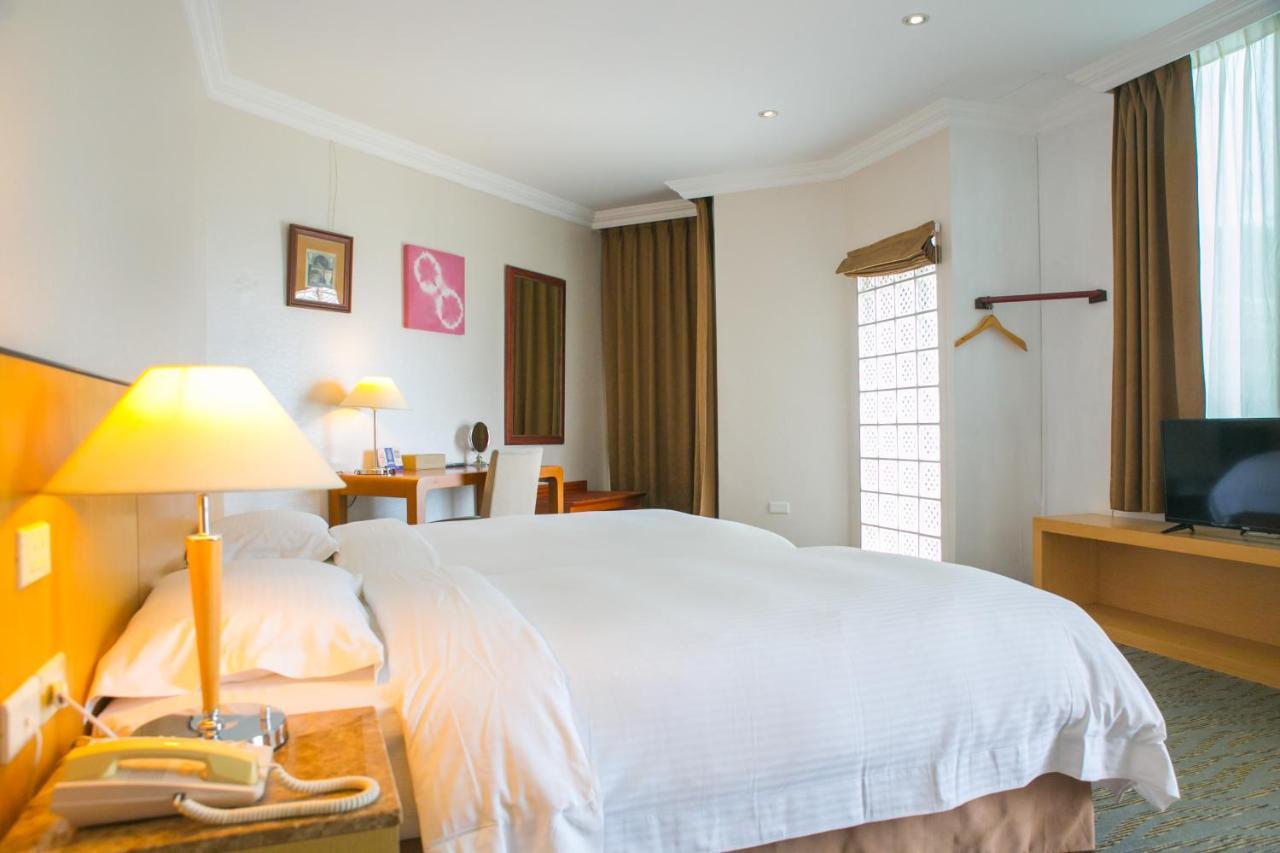 เจียวสี - เดอะ ริเวอร์ไซด์ Hotel เจียวซี ภายนอก รูปภาพ